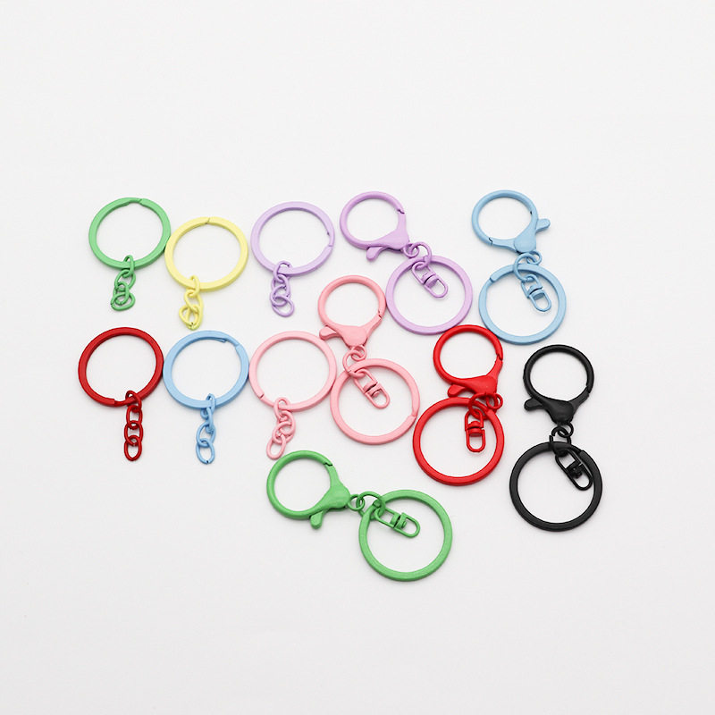 Factory wholesale paint keychain spray paint color lobster buckle three-piece set doll hanging buckle keychain three-piece set