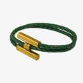 Gold buckle + green rope