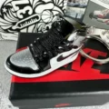 57. black and silver toes + box