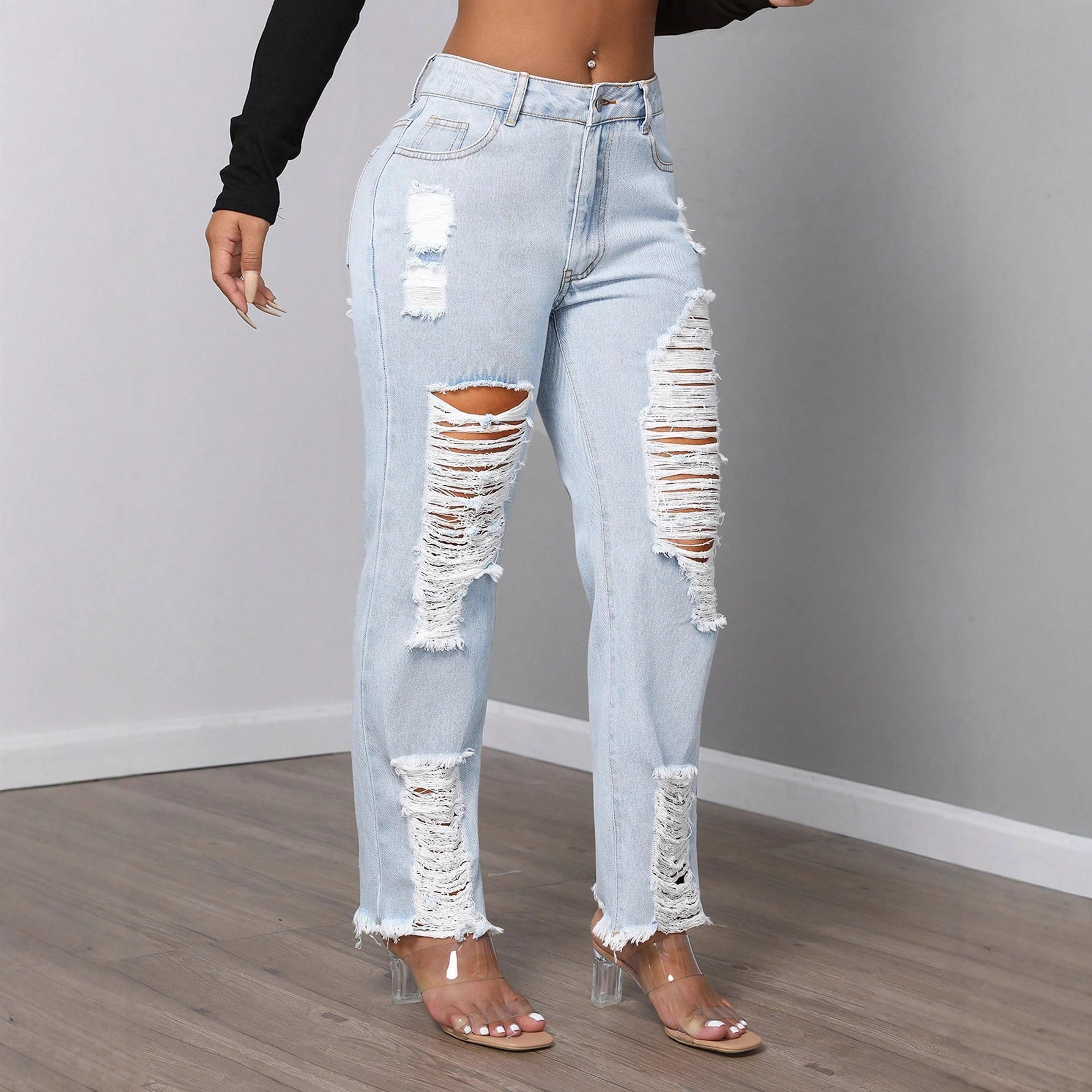 Womens Mid Rise Fashionable Ripped Denim Jeans Casual Style Comfortable Fit Versatile Wear Wholesale Available
