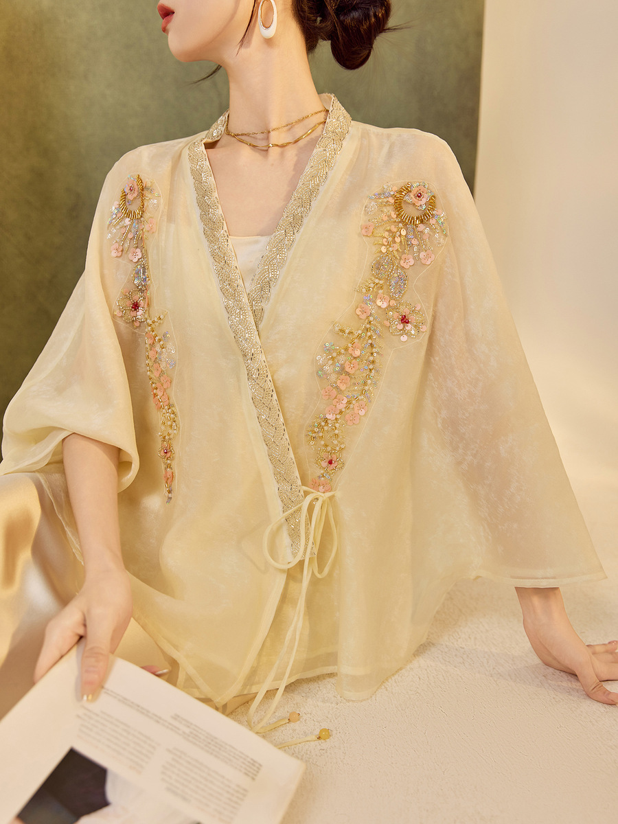 Áo khoác cardigan nữ dáng rộng thêu đính cườm chất liệu tencel phong cách nhẹ nhàng — mơ