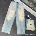 Dirty ripped ripped jeans