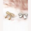 Fashionable metal bow trendy button women's clothing accessories button knitted cardigan sweater leather coat button