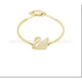 Gold swan bracelet