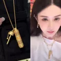 GF122-rattle six carry buddha necklace