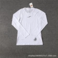 White long-sleeved top with a center hook closure