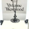 [black beads] medium carved orb three-dimensional saturn necklace