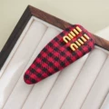 Red houndstooth [with label on the back]