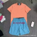 Nk orange suit blue pants