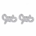 Bow platinum and white diamond stud earrings