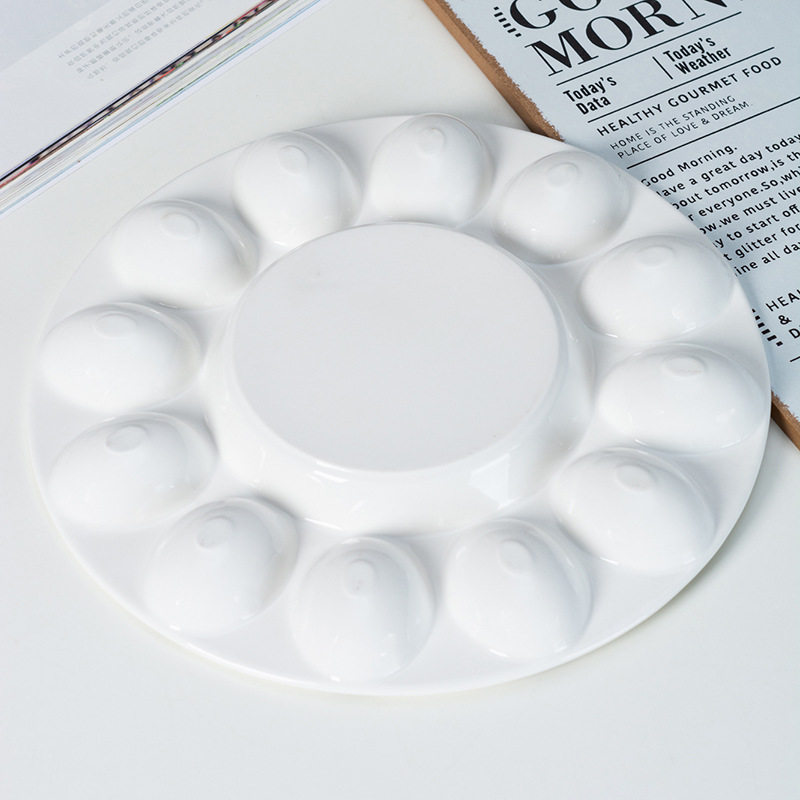 French-style ceramic baking screw plate microwave oven Amazon creative 19-grid egg doll baking plate snail baking plate Christmas ceramic