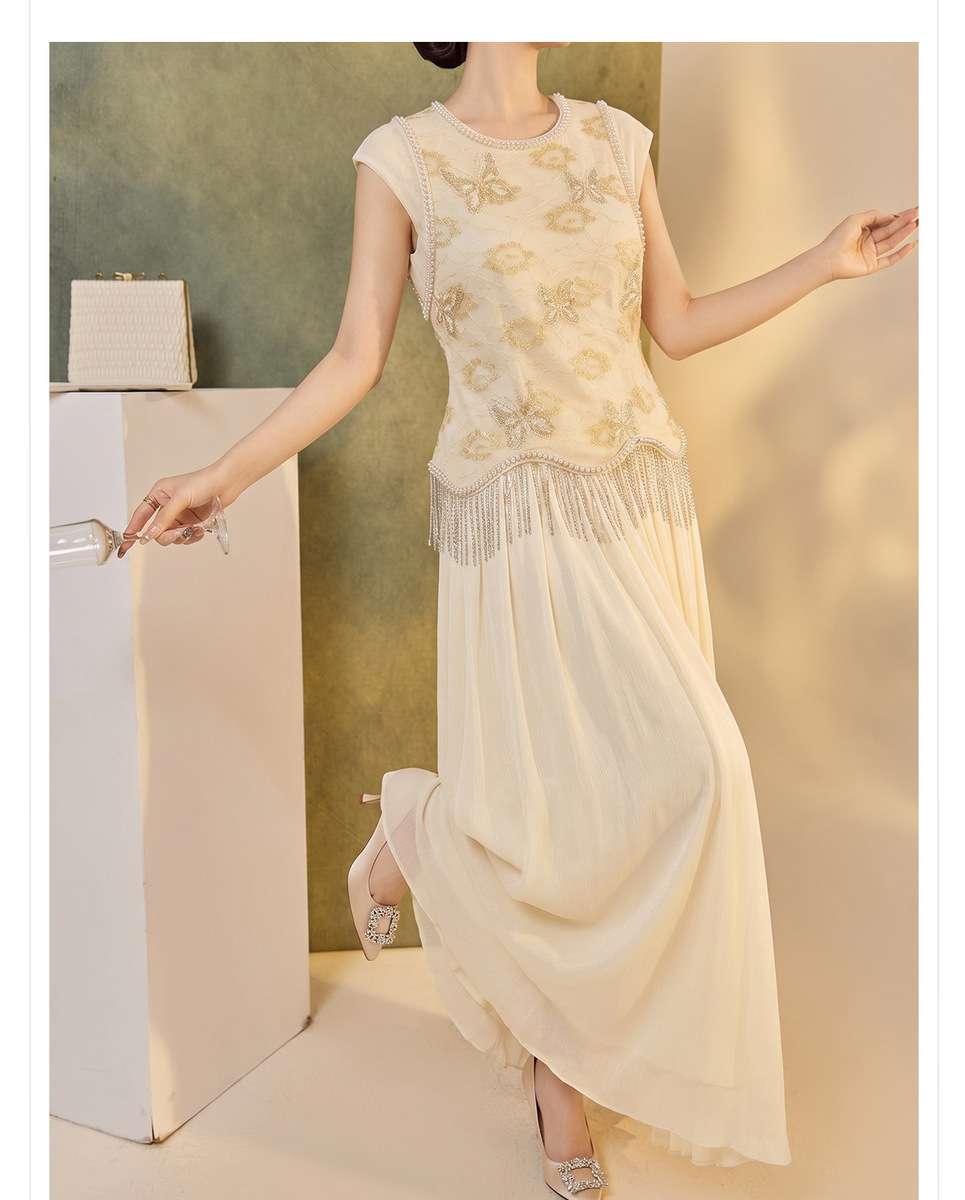 Bộ áo gile thêu đính cườm phối chân váy dài dáng thanh lịch — Chân váy lấp lánh (giao hàng trong 7 ngày), Chân váy lấp lánh (giao hàng trong ngày), Áo gile tua rua (giao hàng trong 7 ngày), Áo gile tua rua (giao hàng trong ngày)
