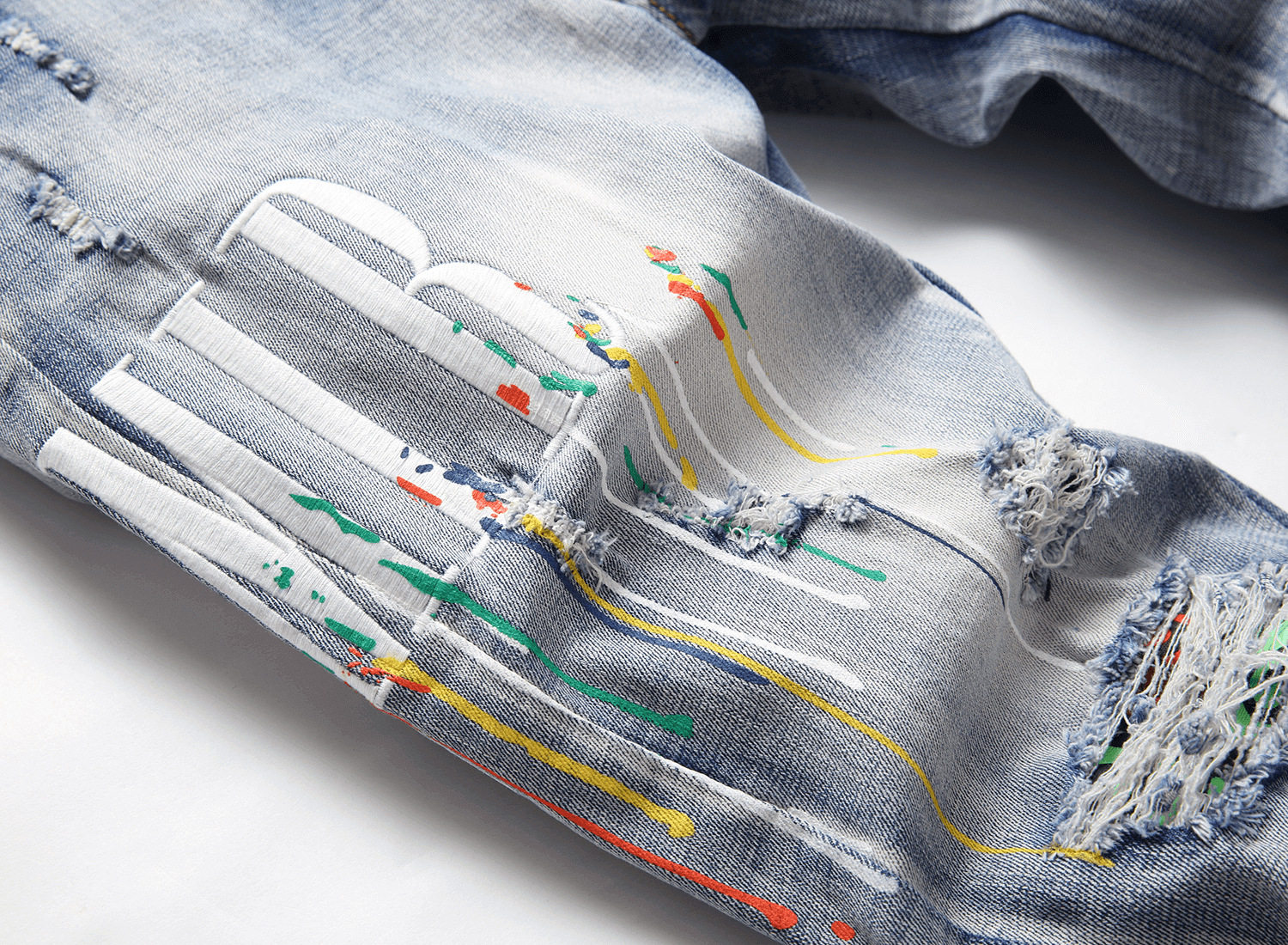 AM European and American high street trendy men's blue skinny jeans embroidered paint hole stretch small straight leg pants cross-border 3730