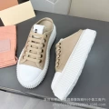 Khaki-colored slippers
