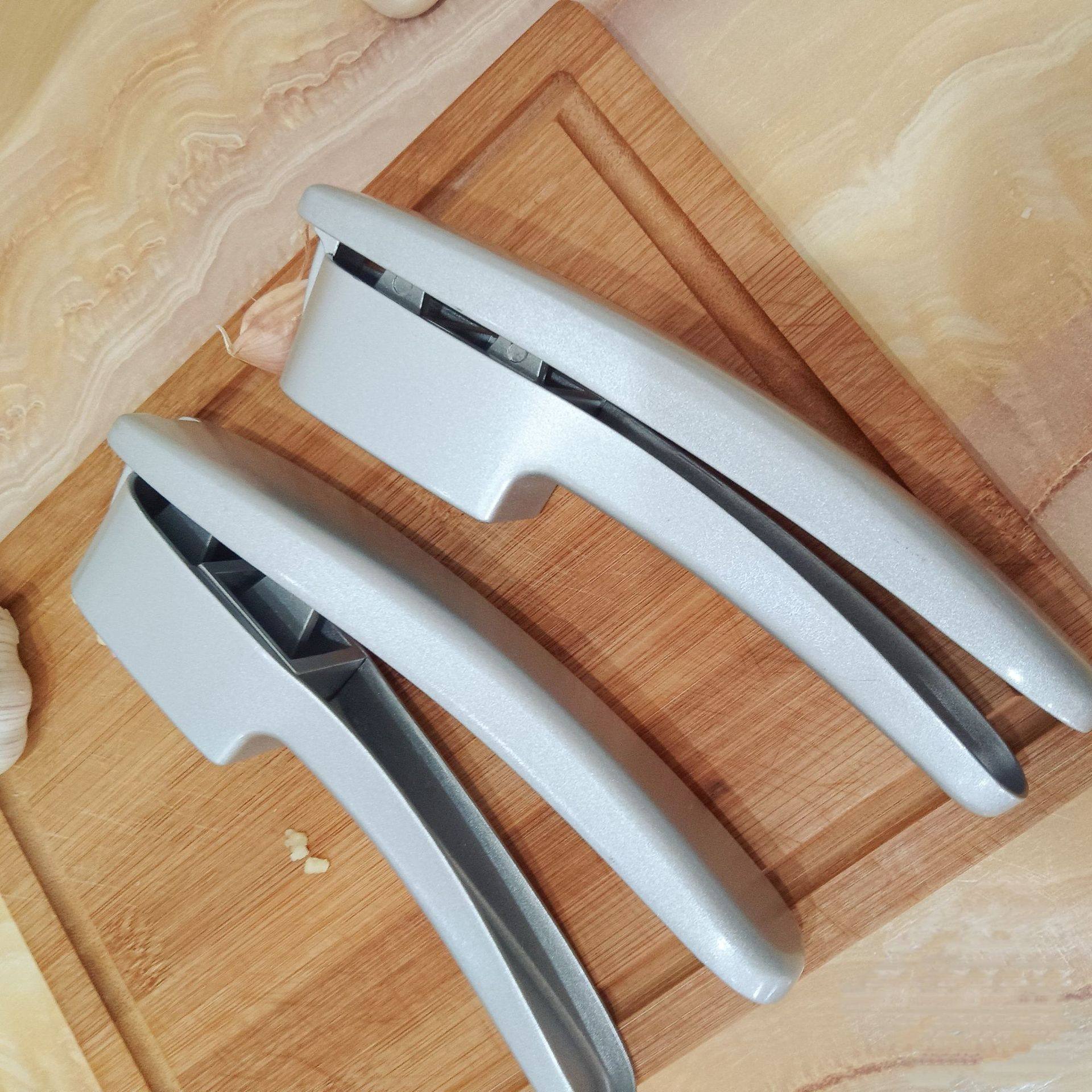 Cross-border alloy two-in-one garlic press manual garlic pureer garlic cutter household garlic stir garlic pounding artifact wholesale