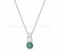 Three-diamond white gold necklace with green diamond accent