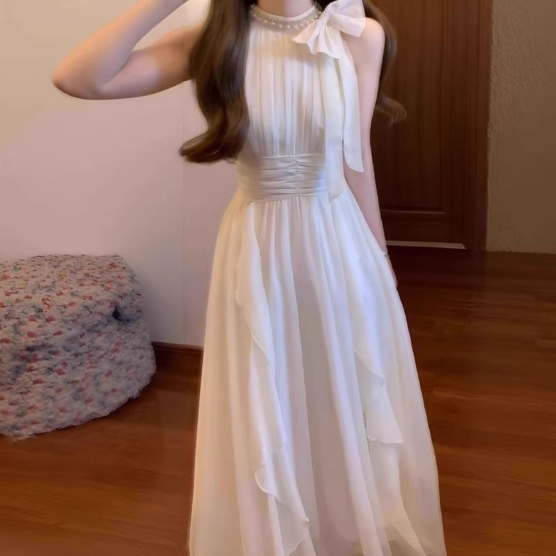 Sleeveless Halter Neck Dress Ruffled Hem Waist Defined French Style Perfect for Summer Events Wholesale Available