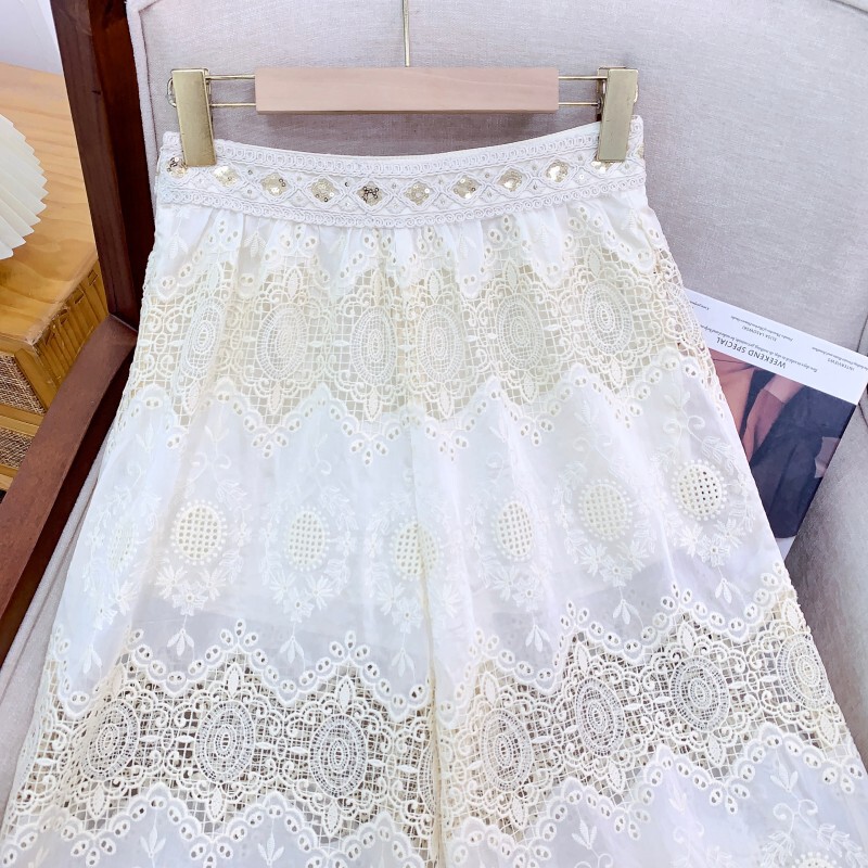 Quần dài nữ ống rộng ren thêu khoét hở lưng cao — Lan đen, Ngọc Hạnh