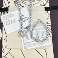 Silver and Purple Saturn Pearl Necklace