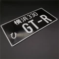 Yokohama 330-gtr black background with white letters
