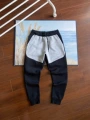 Black and light gray trousers
