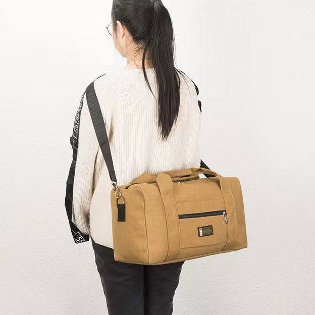 Canvas handbag large capacity wear-resistant luggage bag travel bag travel backpack outdoor travel bag manufacturers wholesale