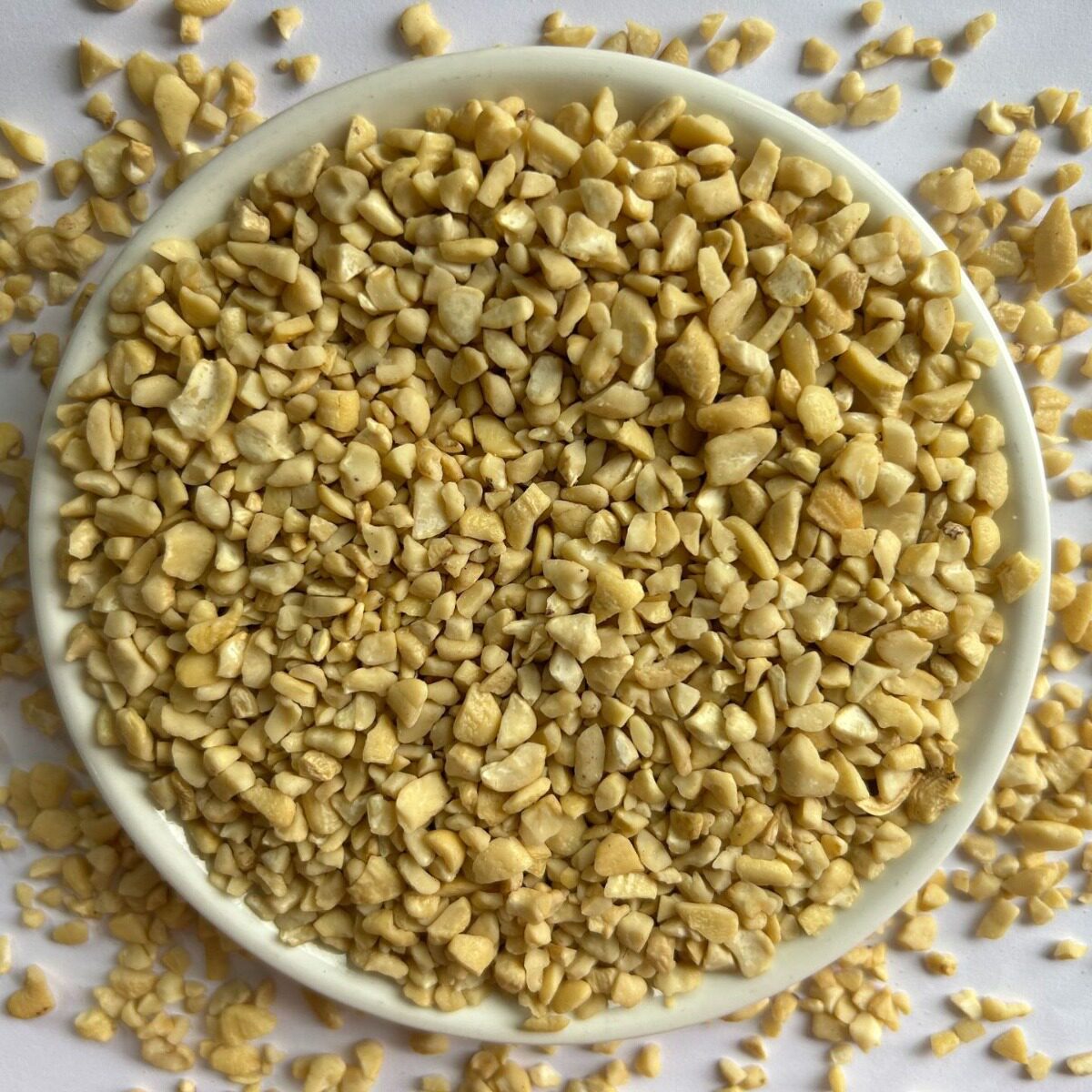 According to KG Vietnam cashew nuts crushed half kernel nuts wholesale plain imported bulk raw material baking special salt baked half