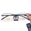 The new men's time-keeping eyelashes with the same business half-frame half-titanium glasses frame can be equipped with the number of glasses frame 8581