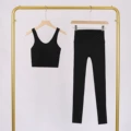 Black polka dot y-shaped vest and cropped pants suit