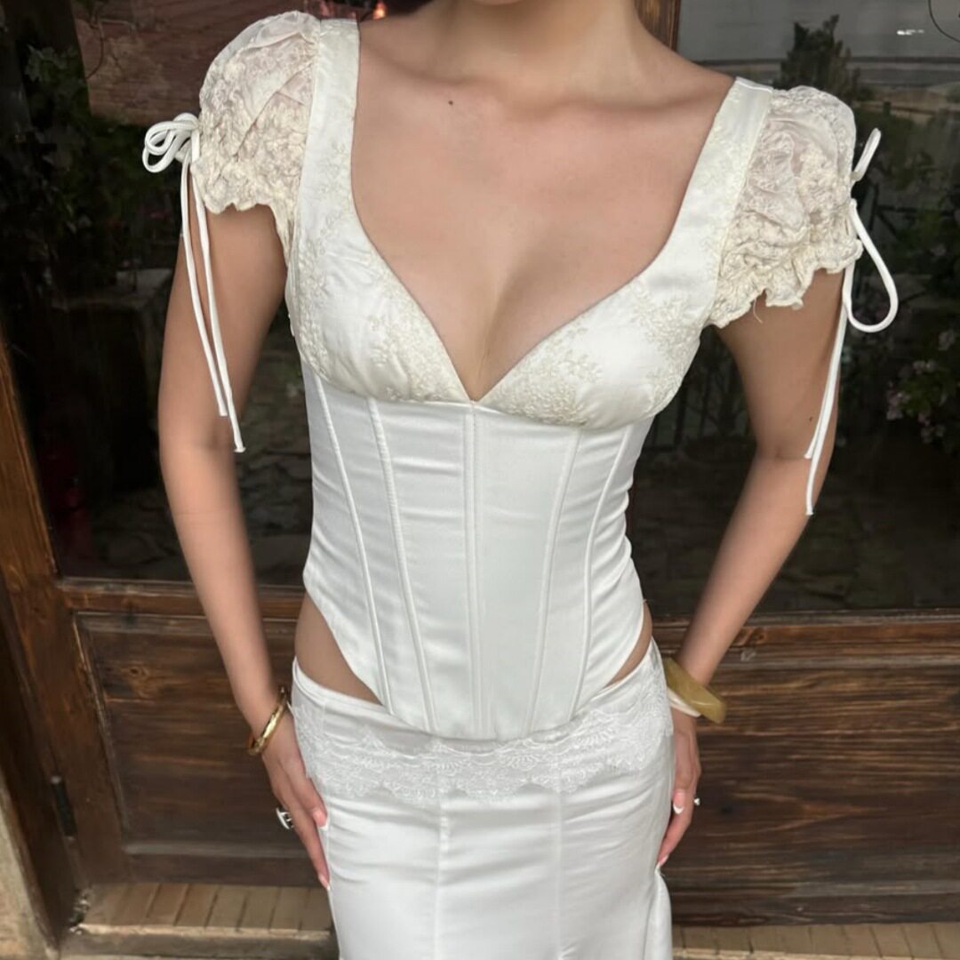 Womens Summer V Neck Ruched Wrap Top Puff Sleeves Irregular Fit Lightweight Fabric Casual Wear Wholesale Available
