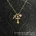 Golden sugar cube-light pink diamond double cross necklace