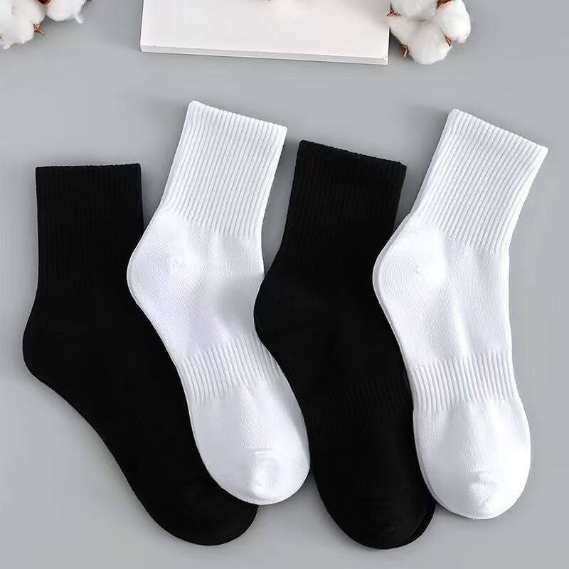 Zhuji Black and white solid color mid-calf sports socks, bre...