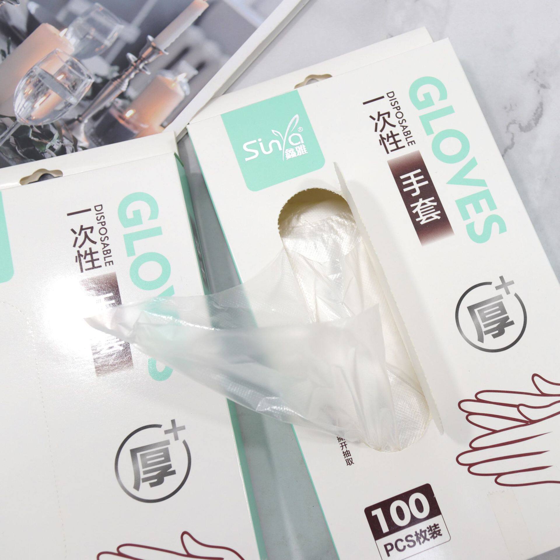 Xinya Disposable Household Gloves Thickeneded Non-slip Food Catering Baking Plastic Transparent Kitchen Gloves Hot Style