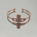 Rose gold colored diamond saturn bracelet