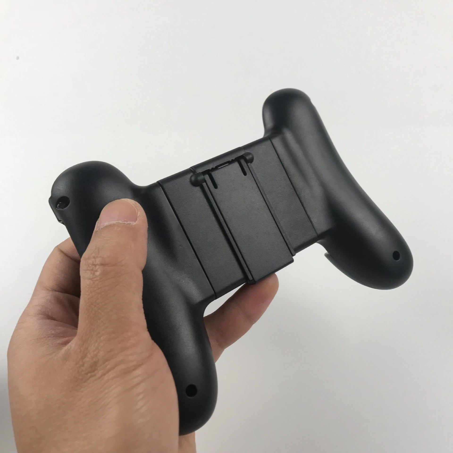 Mobile phone game handle wholesale two-in-one retractable play chicken eating handle bracket grip hand travel auxiliary artifact