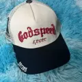 Beige, black and red embroidery