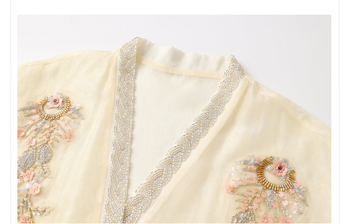 Áo khoác cardigan nữ dáng rộng thêu đính cườm chất liệu tencel phong cách nhẹ nhàng — mơ