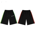 Black green yellow black red stripes