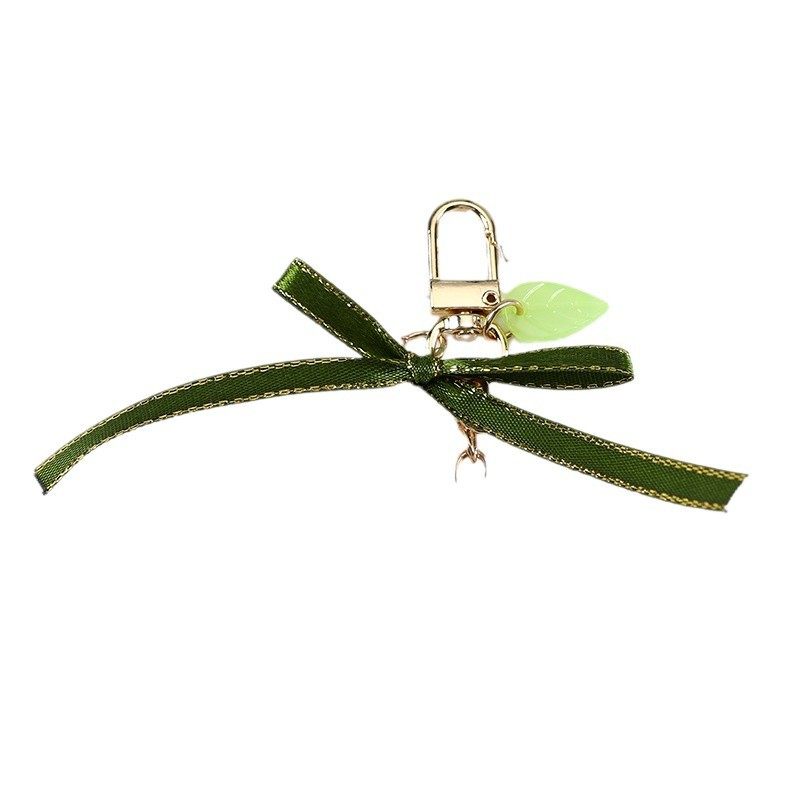 New Green Ribbon Car Keychain Pendant Creative Lily Flower Pearl Chain Hanging Headset Bag Decoration