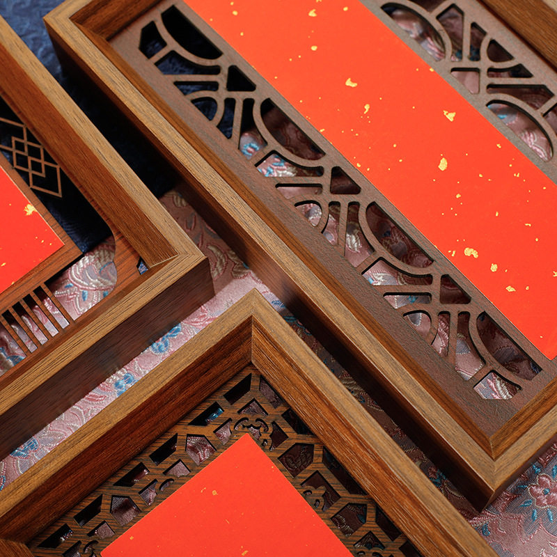 Calligraphy frame calligraphy frame frame mounting frame wooden hollow carving frame gold blank red paper manufacturers wholesale