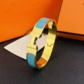 Size 17 wide version 12mm gold + light blue bracelet with logo h