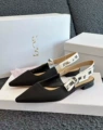 Black knitted flats