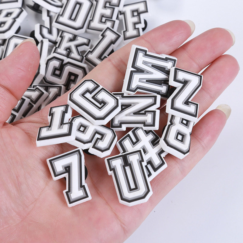 Cross-border pvc black and white gray letter shoes flower shoe buckle digital hole shoes diy accessories hole shoes decoration wholesale accessories