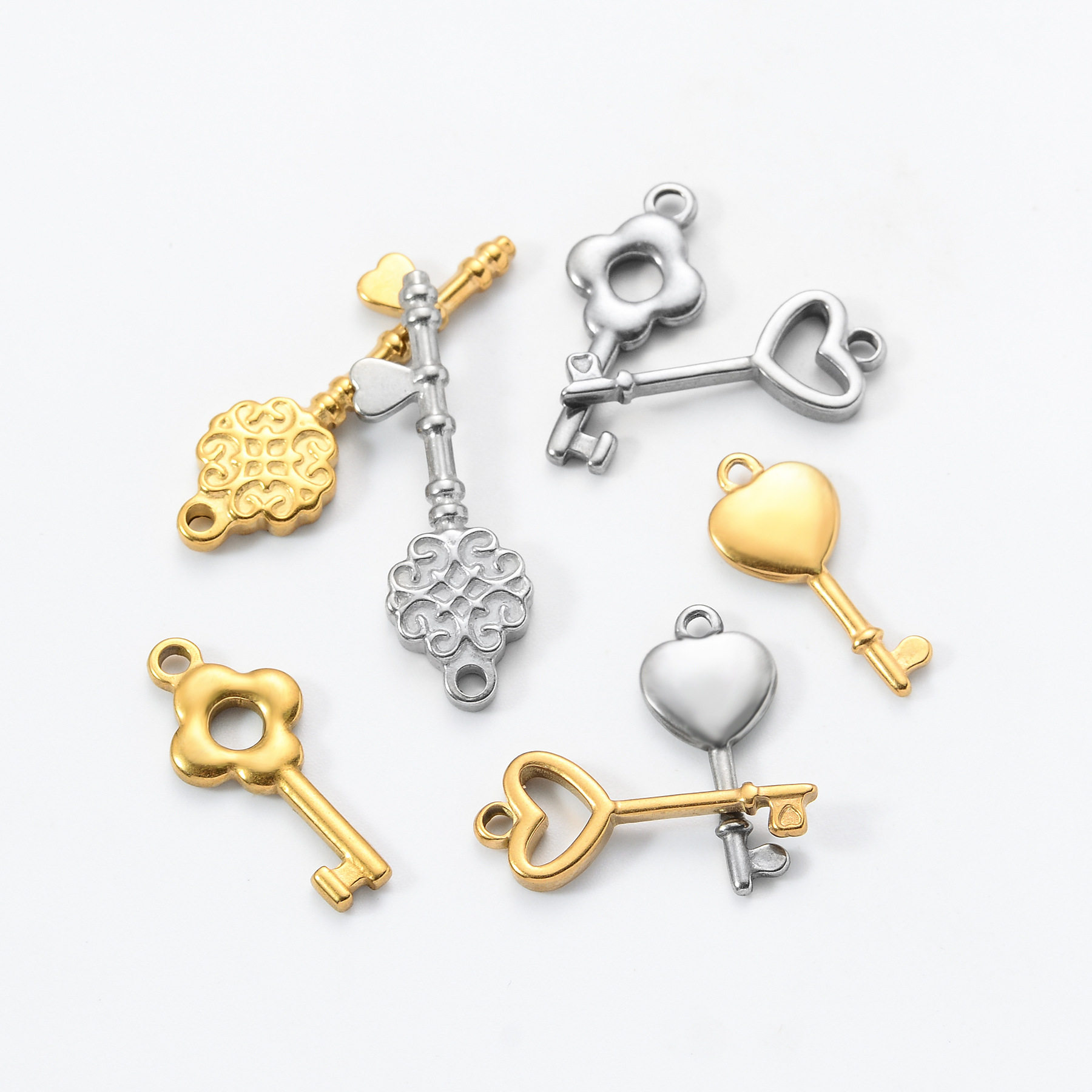 European and American Stainless Steel Oil Pressure Hollow Key Small Pendant DIY Necklace Bracelet Fashion Small Key Titanium Steel Accessories