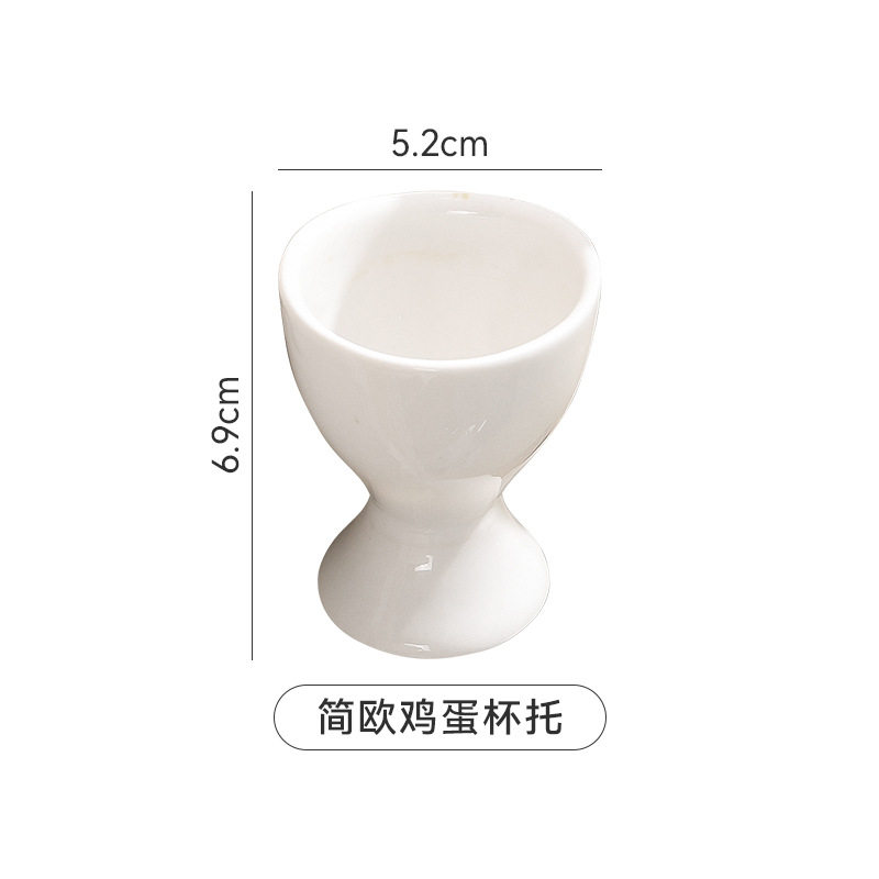 Simple ceramic egg cup egg cup egg cup egg cup high leg egg tray simple dining table Cup bracket creative candle Cup decoration