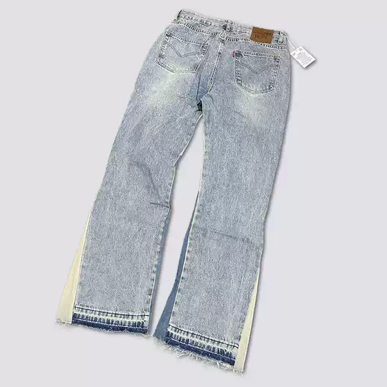 Gallery Dept. Denim Flared Pants with Washed and Distressed Patchwork Design