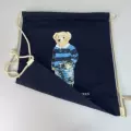 Blue striped polo shirt with bear pocket - navy blue