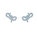 Bow white gold light blue diamond stud earrings