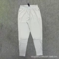 Light gray track and field trousers