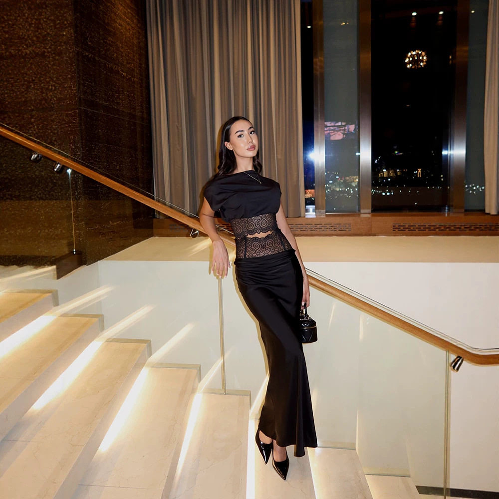 Black Asymmetrical Neck Top and Lace Trimmed Skirt Set Elegant Two Piece Outfit for Women Perfect for Parties and Events